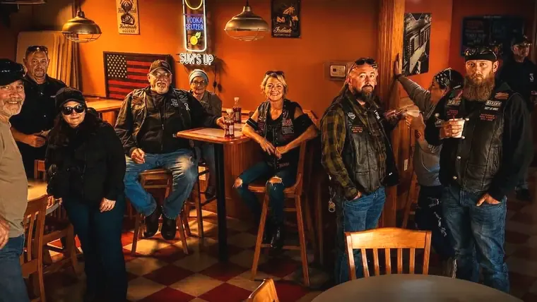 Riders gathered at a Poker Run stop